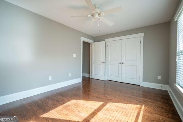 215 Chapman Pl, Athens, GA 30606 - unfurnished bedroom featuring wood finished floors, a closet, and a ceiling fan