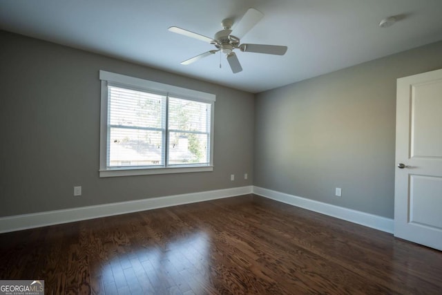 215 Chapman Pl, Athens, GA 30606 - empty room featuring dark wood finished floors, ceiling fan, and a smoke detector
