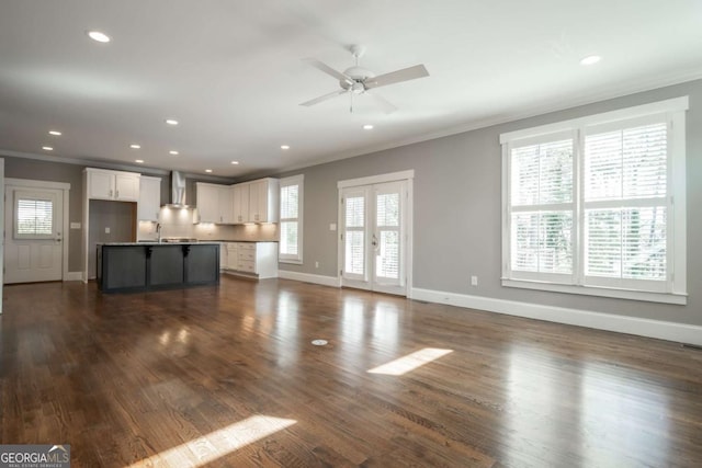 215 Chapman Pl, Athens, GA 30606 - unfurnished living room featuring crown molding, a ceiling fan, dark wood-style floors, and recessed lighting