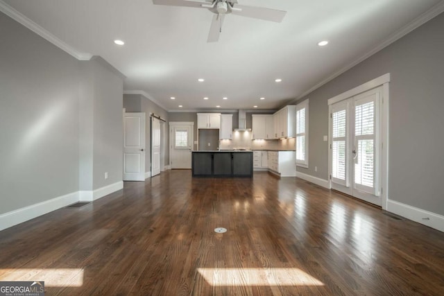 215 Chapman Pl, Athens, GA 30606 - unfurnished living room featuring ornamental molding, ceiling fan, dark wood-type flooring, and recessed lighting