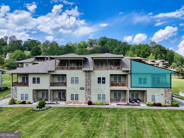 1649-H Lakeview Dr, Young Harris, GA 30582 - view of building exterior with view of wooded area