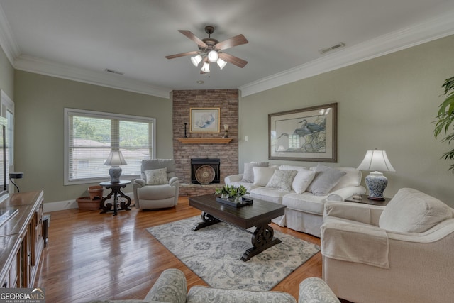 1649-H Lakeview Dr, Young Harris, GA 30582 - living room featuring a ceiling fan, wood finished floors, crown molding, a large fireplace, and baseboards