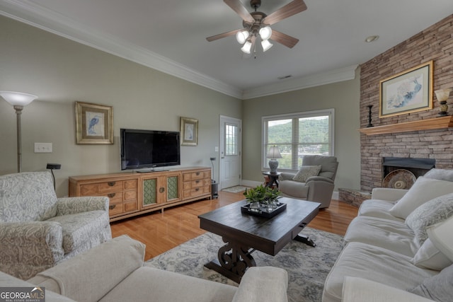 1649-H Lakeview Dr, Young Harris, GA 30582 - living room featuring a ceiling fan, crown molding, light wood-type flooring, and a fireplace