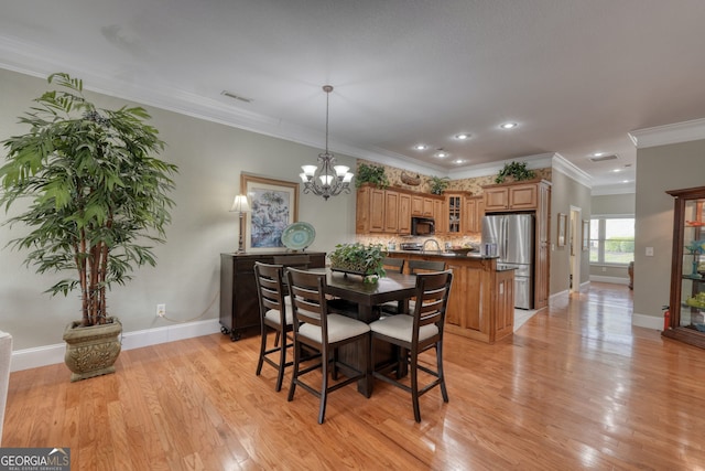 1649-H Lakeview Dr, Young Harris, GA 30582 - dining area with a chandelier, light wood-style flooring, baseboards, recessed lighting, and ornamental molding