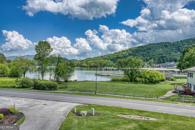 1649-H Lakeview Dr, Young Harris, GA 30582 - water view with fence, a mountainous background, and a forest