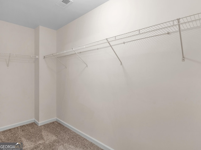 1064 Lear Dr, Locust Grove, GA 30248 - spacious closet featuring carpet