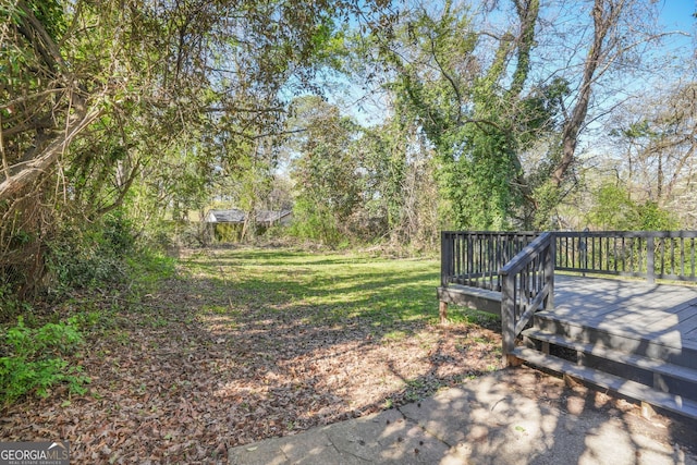 1013 Columbia Dr, Decatur, GA 30030 - view of grassy yard with a deck