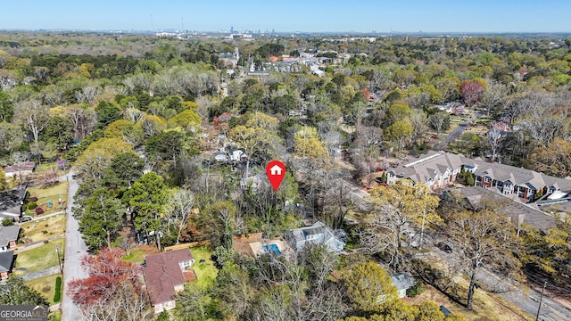 1013 Columbia Dr, Decatur, GA 30030 - aerial view of property's location featuring a heavily wooded area