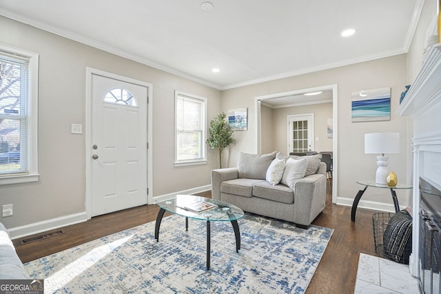 1013 Columbia Dr, Decatur, GA 30030 - living room with a fireplace with flush hearth, wood finished floors, ornamental molding, and recessed lighting