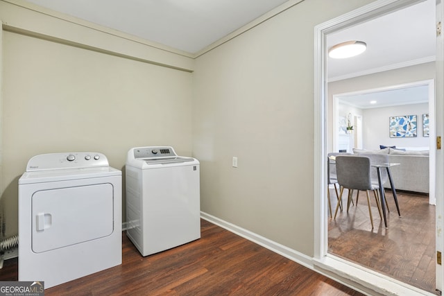 1013 Columbia Dr, Decatur, GA 30030 - laundry area featuring crown molding, washing machine and dryer, and dark wood-style floors