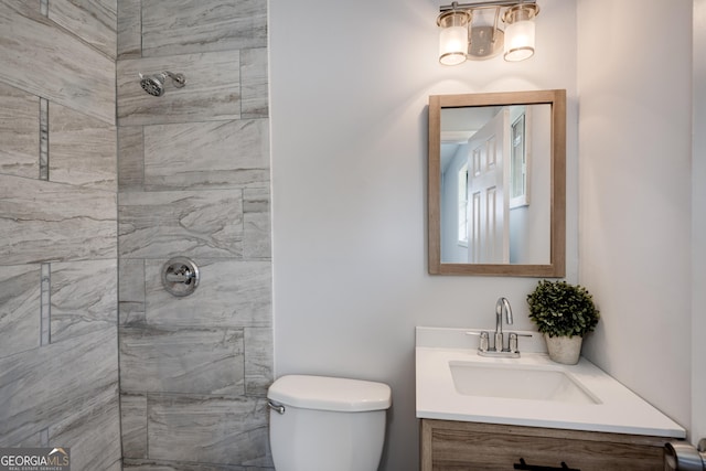 2352 Helsinki Dr, Augusta, GA 30906 - bathroom with toilet, vanity, and tiled shower