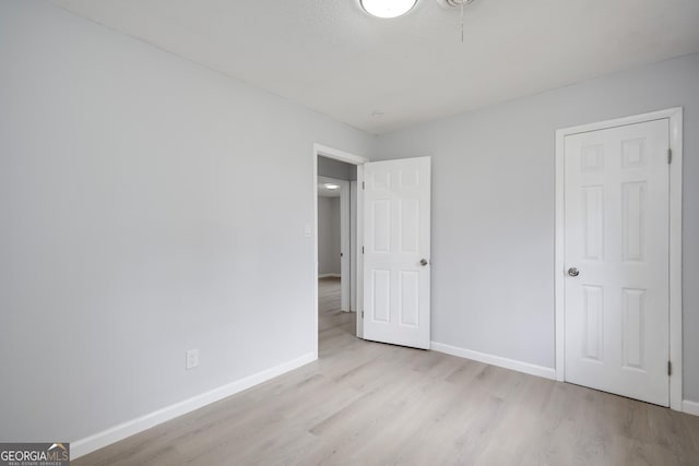 2352 Helsinki Dr, Augusta, GA 30906 - unfurnished bedroom featuring baseboards and wood finished floors