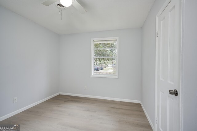 2352 Helsinki Dr, Augusta, GA 30906 - spare room with baseboards, wood finished floors, and a ceiling fan