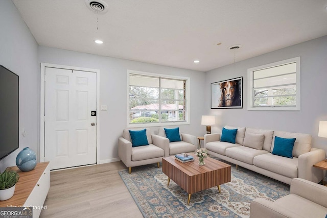 2352 Helsinki Dr, Augusta, GA 30906 - living area featuring a wealth of natural light, light wood-style floors, and visible vents