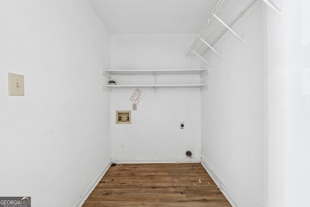 washroom featuring wood finished floors, hookup for an electric dryer, laundry area, and washer hookup