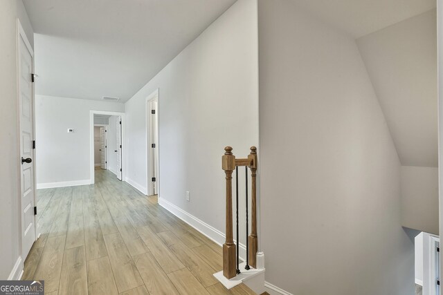 8 Sumner Way, Senoia, GA 30276 - corridor featuring baseboards, an upstairs landing, visible vents, and light wood-type flooring