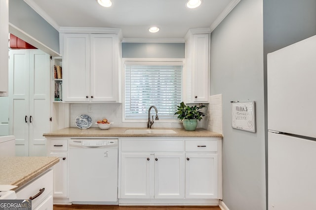2926 Westbury Dr, Decatur, GA 30033 - kitchen featuring backsplash, a sink, white cabinetry, white appliances, and recessed lighting