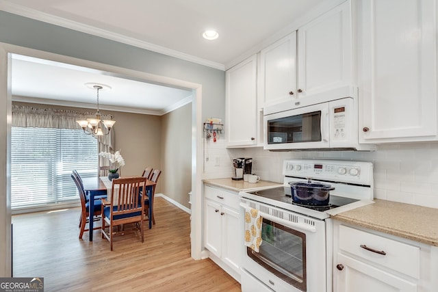 2926 Westbury Dr, Decatur, GA 30033 - kitchen with white cabinets, ornamental molding, a notable chandelier, and white appliances