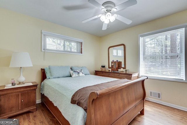 2926 Westbury Dr, Decatur, GA 30033 - bedroom with multiple windows, visible vents, and light wood-style flooring