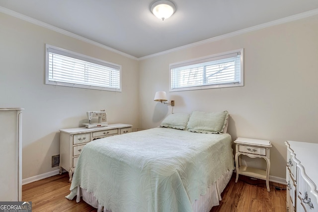 2926 Westbury Dr, Decatur, GA 30033 - bedroom with baseboards, ornamental molding, and light wood-type flooring