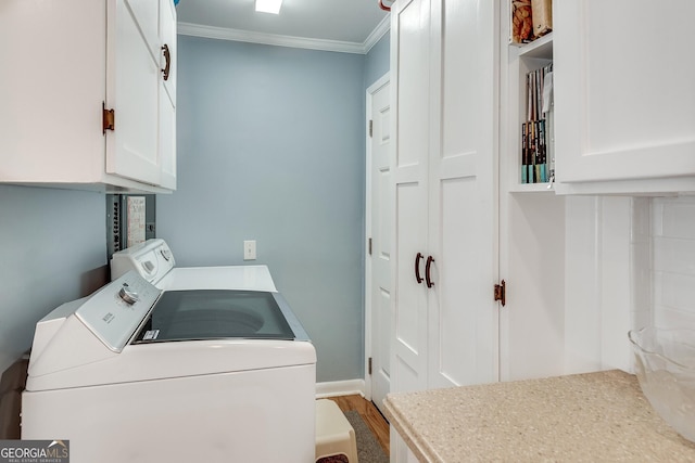 2926 Westbury Dr, Decatur, GA 30033 - laundry room with cabinet space, washing machine and dryer, and crown molding