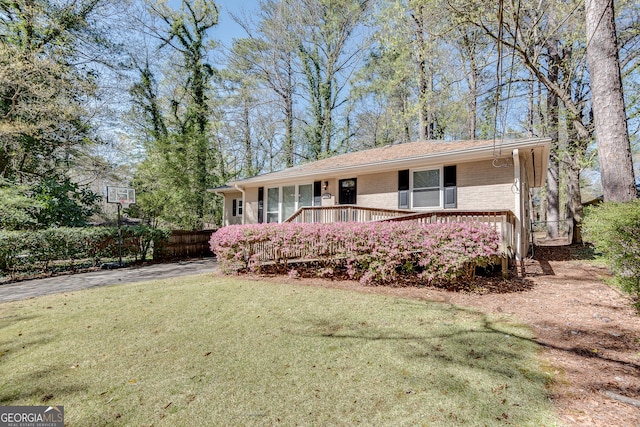 2926 Westbury Dr, Decatur, GA 30033 - single story home with driveway, a front yard, a porch, and brick siding