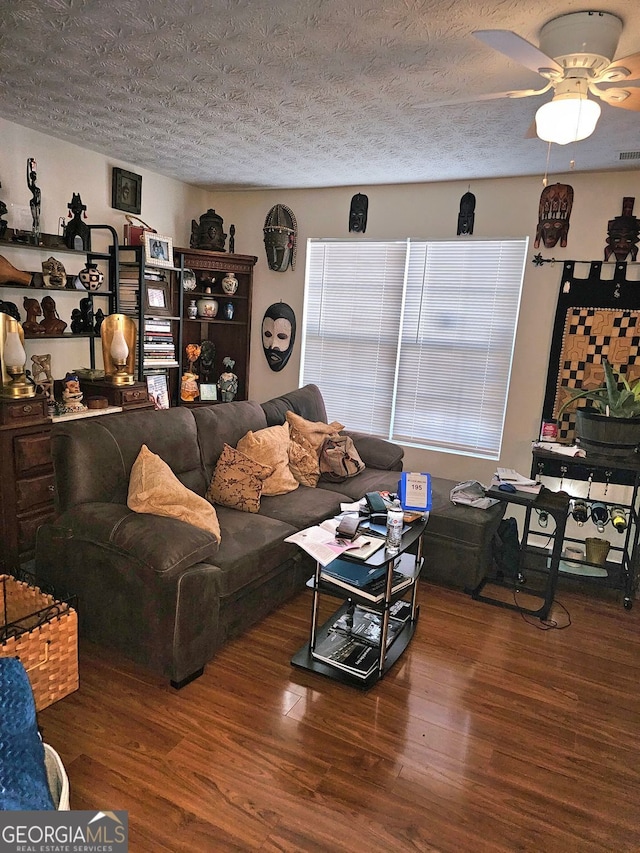 315 Saratoga Pl, Riverdale, GA 30296 - living area with a ceiling fan, wood finished floors, and a textured ceiling
