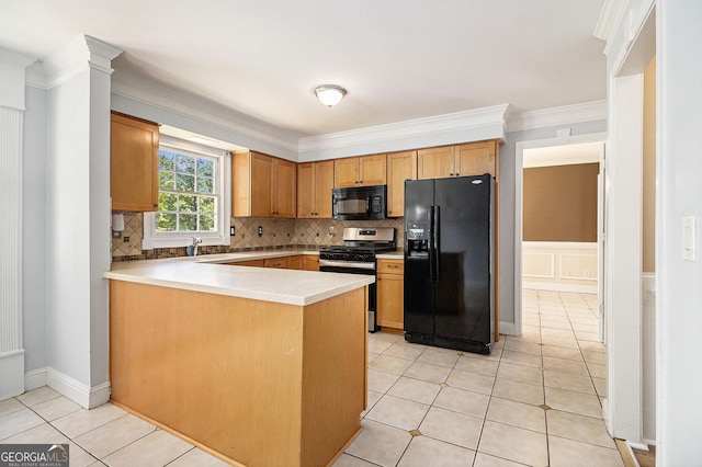 1472 Hartman Dr SW, Lilburn, GA 30047 - kitchen with black appliances, a peninsula, a sink, decorative backsplash, and ornamental molding