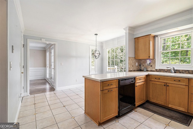 1472 Hartman Dr SW, Lilburn, GA 30047 - kitchen with dishwasher, a peninsula, a sink, light countertops, and tasteful backsplash