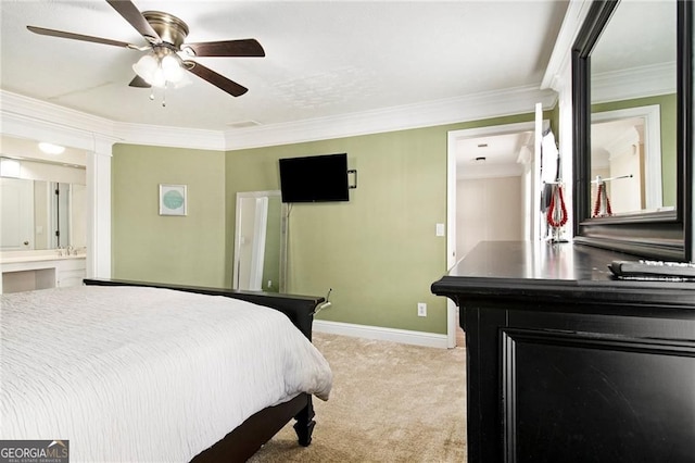 1472 Hartman Dr SW, Lilburn, GA 30047 - bedroom featuring light colored carpet, baseboards, ornamental molding, ensuite bath, and a ceiling fan