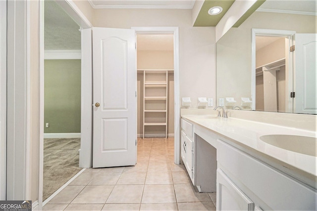 1472 Hartman Dr SW, Lilburn, GA 30047 - full bath featuring double vanity, a walk in closet, tile patterned floors, crown molding, and baseboards