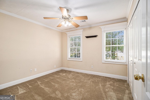 1472 Hartman Dr SW, Lilburn, GA 30047 - unfurnished room featuring carpet floors, baseboards, ornamental molding, and ceiling fan