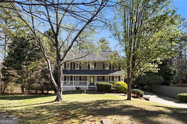 1472 Hartman Dr SW, Lilburn, GA 30047 - view of front facade featuring covered porch