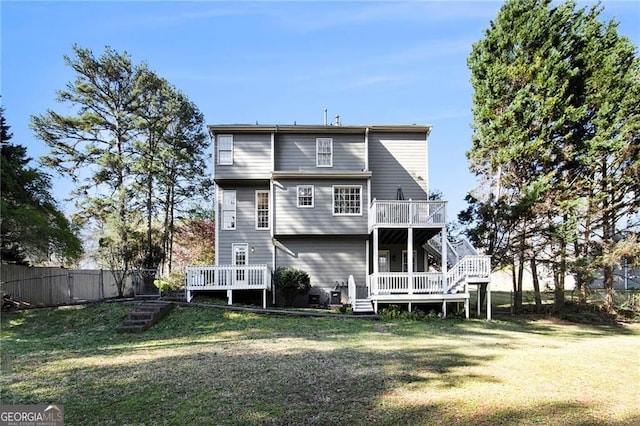 1472 Hartman Dr SW, Lilburn, GA 30047 - rear view of house featuring stairs and a wooden deck