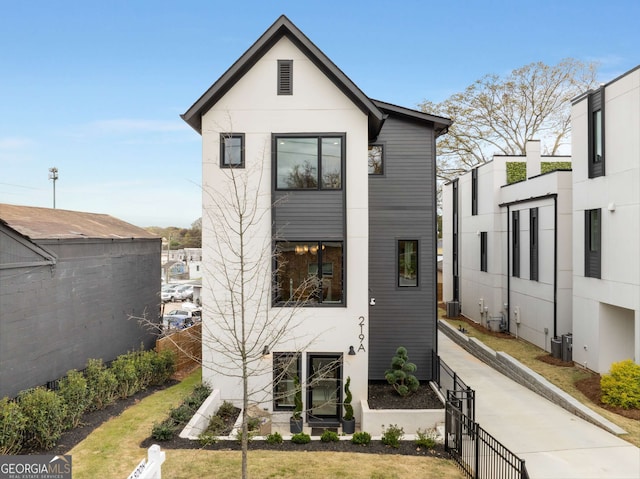 view of front of property with central AC