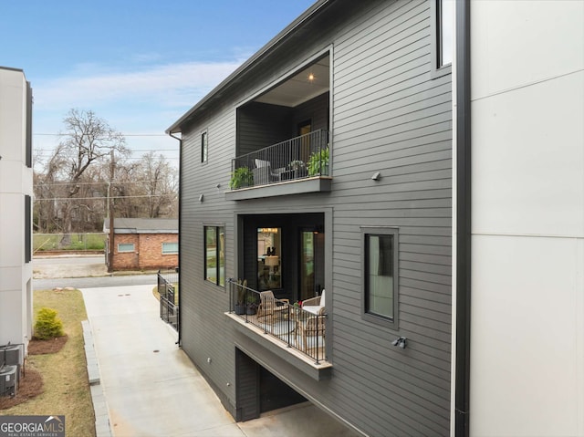 view of home's exterior featuring a balcony
