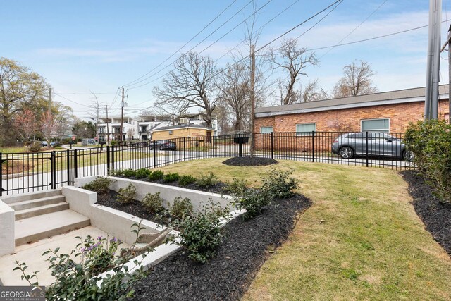 view of yard featuring fence