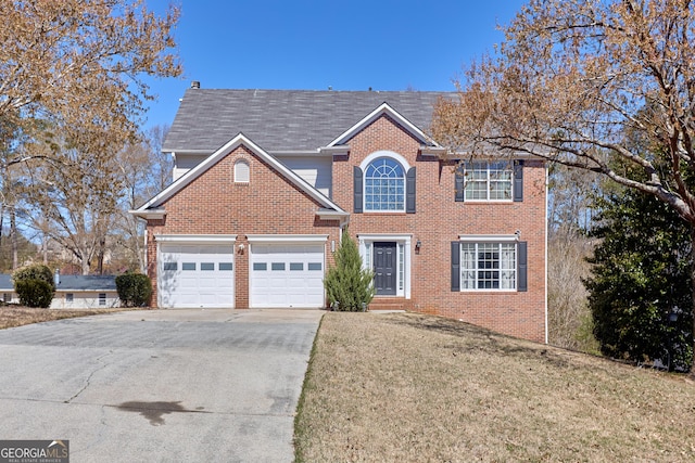 1484 Highland Bluff Ct, Suwanee, GA 30024 - colonial inspired home with brick siding, concrete driveway, an attached garage, and a front lawn
