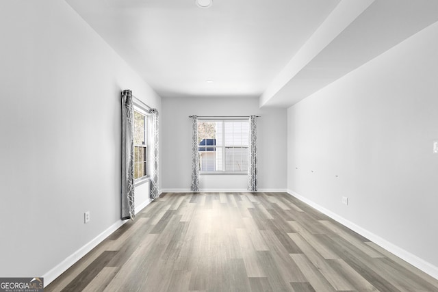 1484 Highland Bluff Ct, Suwanee, GA 30024 - spare room featuring baseboards and wood finished floors