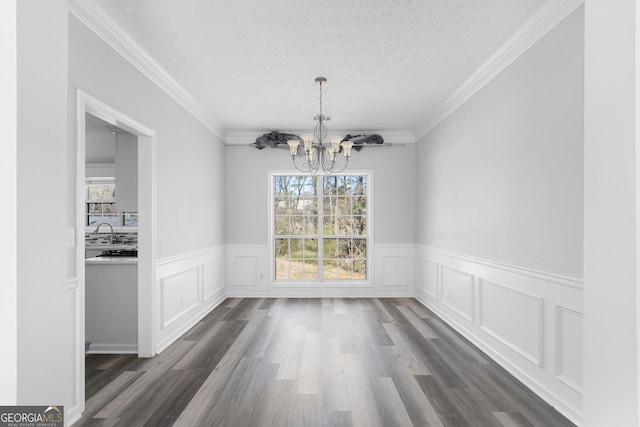 1484 Highland Bluff Ct, Suwanee, GA 30024 - unfurnished dining area with plenty of natural light, dark wood-type flooring, a chandelier, and a textured ceiling
