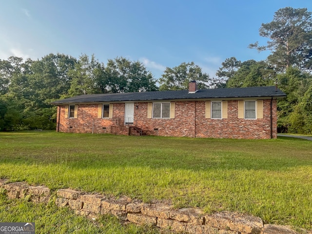 1105 Claxton Dairy Rd, Dublin, GA 31021 - single story home with crawl space, a chimney, and a front yard