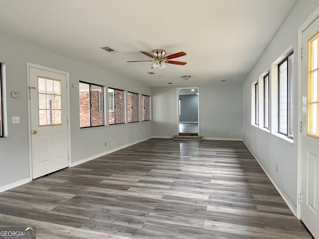 1105 Claxton Dairy Rd, Dublin, GA 31021 - unfurnished room featuring ceiling fan, wood finished floors, and baseboards