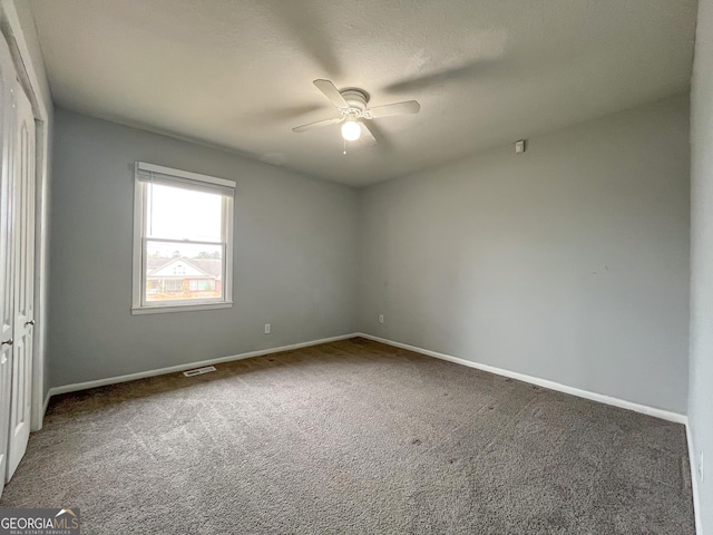 1105 Claxton Dairy Rd, Dublin, GA 31021 - carpeted spare room featuring ceiling fan and baseboards