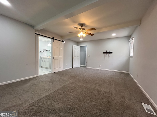 1105 Claxton Dairy Rd, Dublin, GA 31021 - carpeted empty room featuring ceiling fan, a barn door, baseboards, and recessed lighting