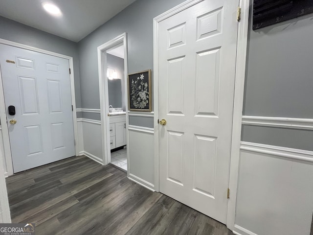 1105 Claxton Dairy Rd, Dublin, GA 31021 - foyer entrance with dark wood-style floors and baseboards