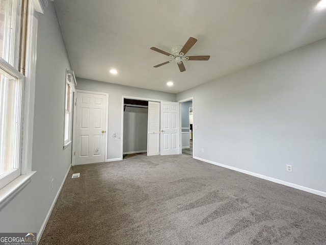 1105 Claxton Dairy Rd, Dublin, GA 31021 - unfurnished bedroom with baseboards, carpet floors, a closet, recessed lighting, and a ceiling fan