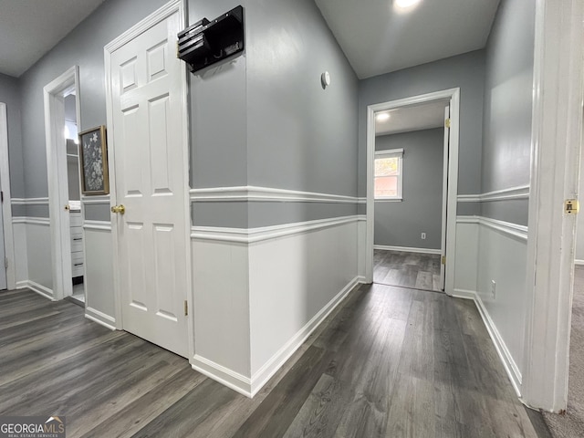 1105 Claxton Dairy Rd, Dublin, GA 31021 - hallway with dark wood-style flooring and baseboards