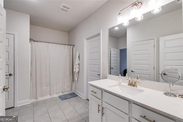 197 Saddleridge Dr, Bremen, GA 30110 - bathroom featuring vanity, tile patterned flooring, and a shower with shower curtain