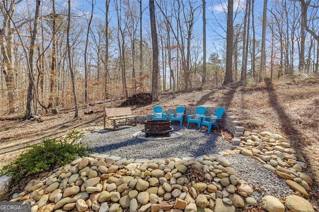 197 Saddleridge Dr, Bremen, GA 30110 - view of patio featuring an outdoor fire pit