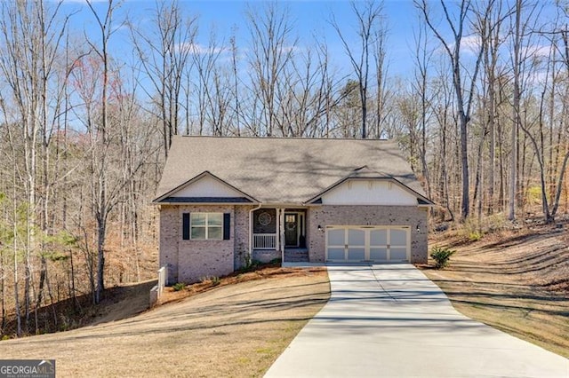 197 Saddleridge Dr, Bremen, GA 30110 - view of front of house featuring a garage, brick siding, and concrete driveway